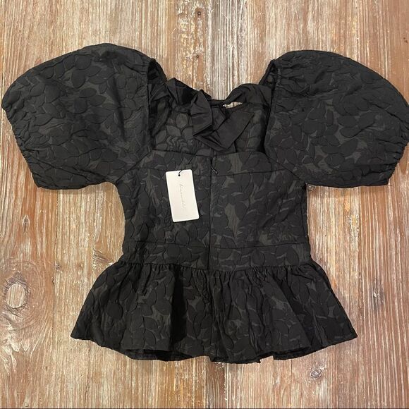 Line + Dot
Delilah Peplum Top  - Picture 9 of 12